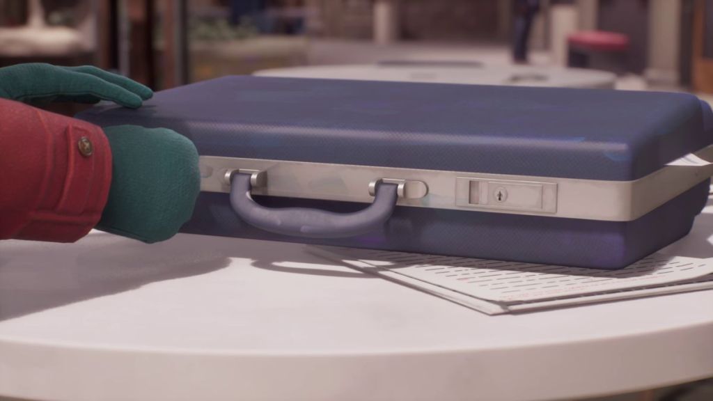 Max opening up Lucas' briefcase