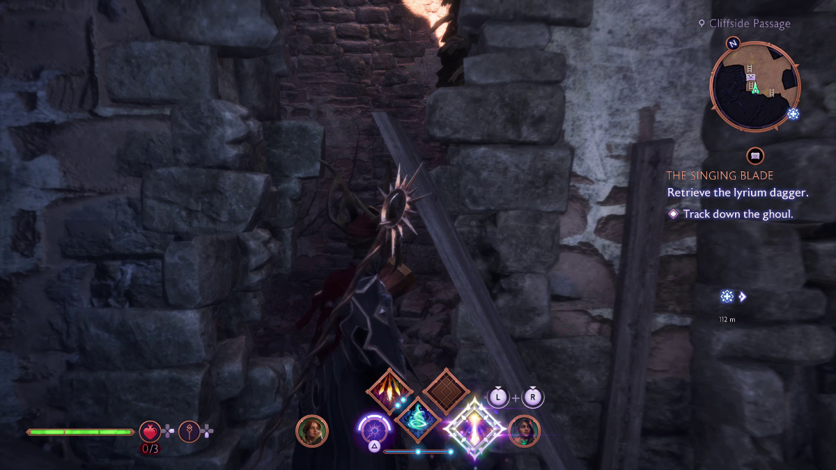 Climb the ladder to the top and cross the broken stonework to the magic device.