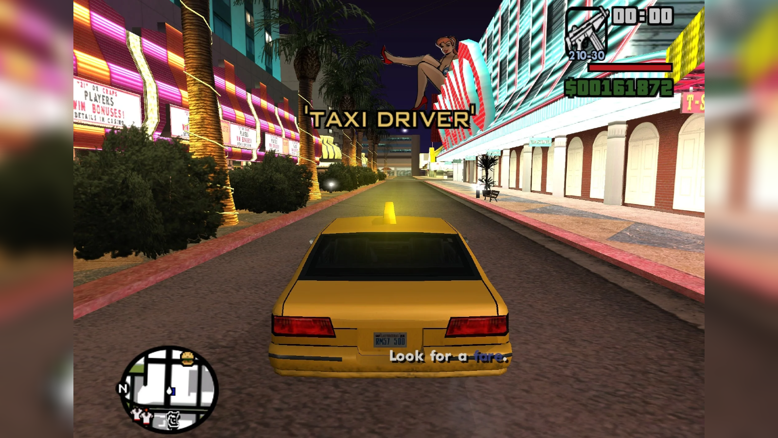 Driving a taxi past casinos in Las Venturas in GTA: San Andreas.