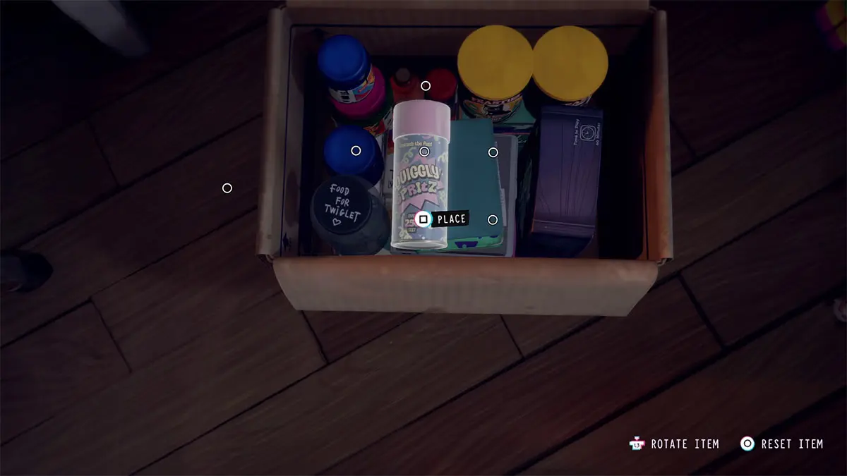 Place the Juggly Spritz can on top of the notebooks.